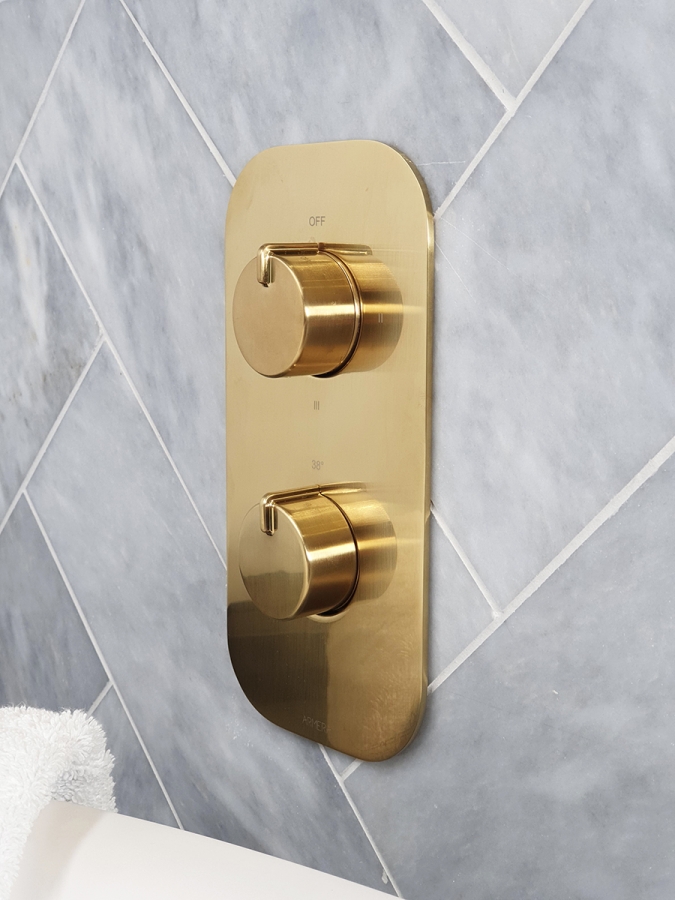 Pivot round 2 outlet concealed valve in brushed gold.
